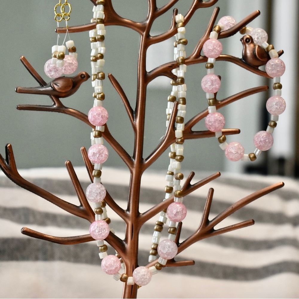Handmade pink, white, and gold necklace, bracelet and earring set.